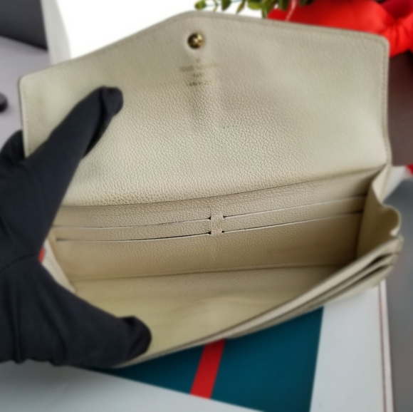 LOUIS VUITTON Portefeuille Empreinte Neige Mono - Picture 3 of 16